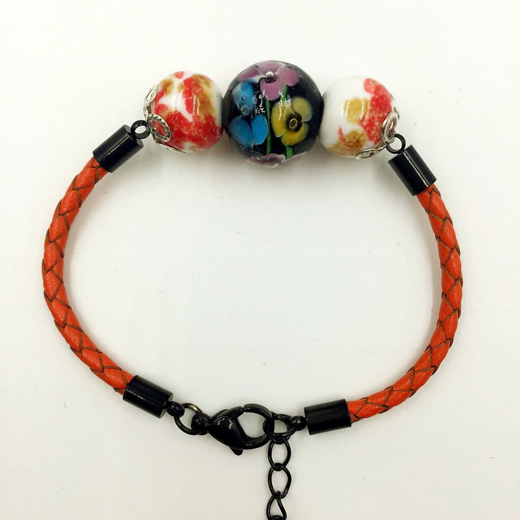 Triple Flower Black and Ceramic Beads on Orange Leather,  - MRNEIO LLC