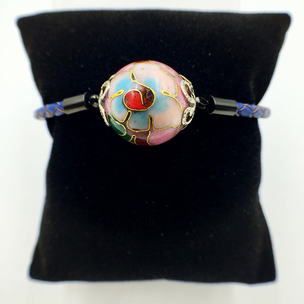 Single Lilac Bead on Navy Blue Leather