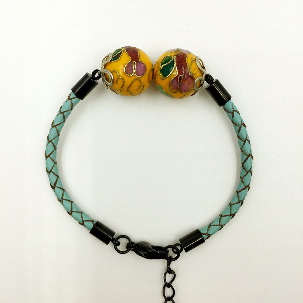 Twin Golden Yellow Beads on Turquoise Leather
