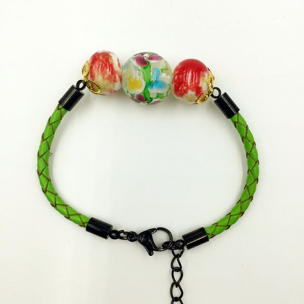 Triple Flower Clear and Ceramic Beads on Green Leather