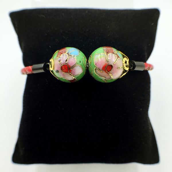 Twin Green Beads on Red Leather