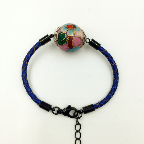 Single Lilac Bead on Navy Blue Leather